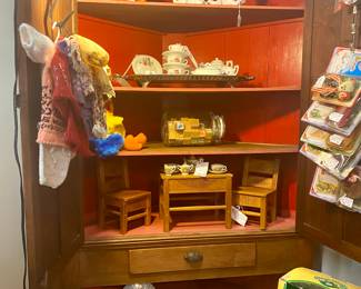 Gorgeous antique walnut corner cabinet with blind doors, original finish and painted interior