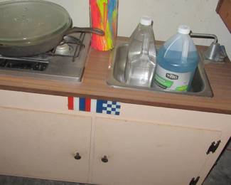 jan camp kitchen with stove