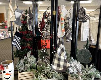room divider, christmas greenery, stockings and tree skirts