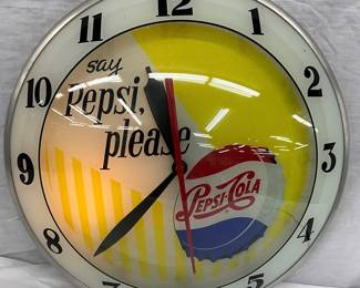 Wall Clock Featuring ‘Say Pepsi, Please’ Branding and Pepsi-Cola Bottle Cap Design