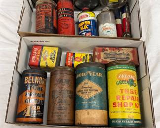 Vintage Automotive Cans and Tire Repair Kits Including Esso, Texaco, DuPont, and Goodyear