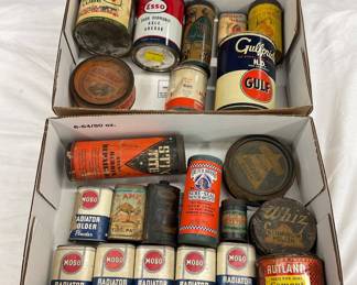 Vintage Automotive and Household Product Cans Including Esso, Wolf’s Head, Camel, and Gulf