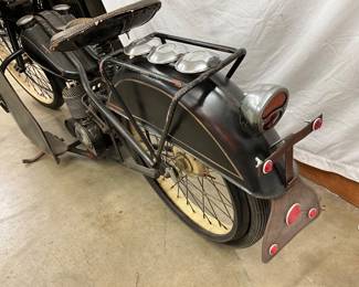 LEATHER SADDLE SEAT/WIRE SPOKED WHEELS