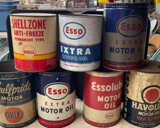 7 Vintage Oil and Anti-Freeze Cans Featuring Esso, Gulfpride, and Shellzone