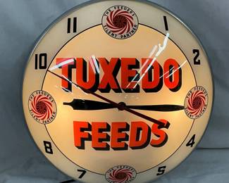 Tuxedo Feeds Double Bubble Advertising Clock