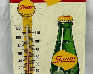 1961 Embossed Squirt Metal Thermometer Sign, 6″ x 13 1/2″
