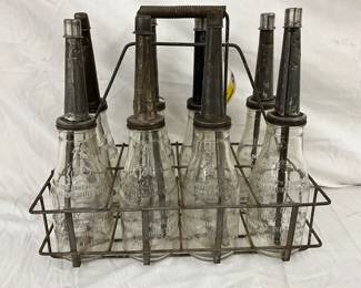 Eight-Piece 1922 Handy Oiler Glass Bottles with Metal Carrier