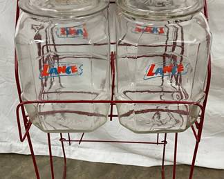 Vintage Lance Four-Jar Rack with Embossed Glass Lids and Red Metal Stand