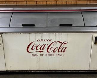 8.5-Foot Dixie-Narco Coca-Cola Cooler with Embossed Branding and Bar Top