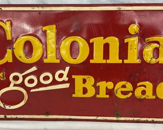 Embossed Metal ‘Colonial Is Good Bread’ Advertising Sign, 27″ x 13.5″