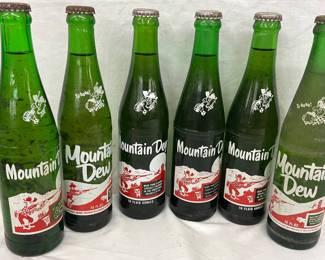 (6) 10OZ. MT. DEW BOTTLES W/PIG