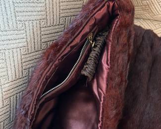 Muff has zipper compartment inside for the lady's valuables!