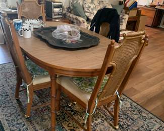 Dining table and chairs on casters 