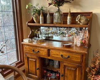 Solid oak buffet server with built in wine glass holder  and plenty of storage.