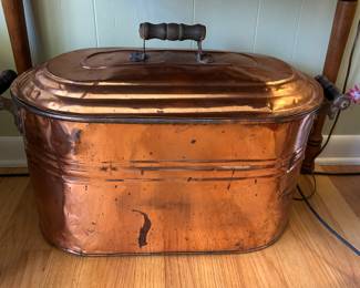Copper wash tub with cover.