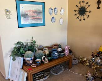 Planters and plants throughout.