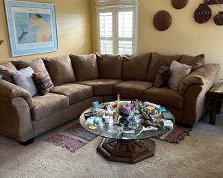 Beautiful sectional plus occasional tables.
