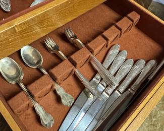 This is a large set of Oneida Tudor community plate flatware with extra pieces