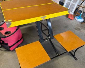 This is a very sturdy and very vintage Handy folding picnic table