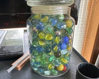 Here’s a large jar of vintage marbles!