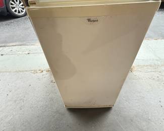 Here’s a nice Whirlpool fridge. It works perfectly and would be great in your garage.