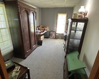 A wide shot of the room, a beautiful armoire to the left and to the right of stunning China cabinet. These are both pictured earlier.