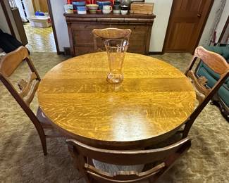 This is an absolutely fantastic oak dining room table and six chairs! Made by the Imperial furniture factory in Grand Rapids, Michigan!