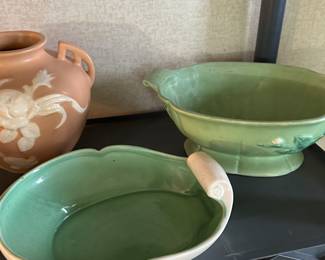 The white piece at center is a Holland Mold pounce from about 1950. The large green bowl at the top R is Weller Pottery.