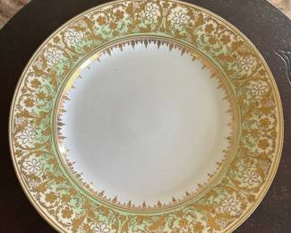 This is a stunning hand, painted heavy guilt porcelain plate! Unmarked as to who the maker is