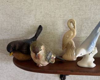 This is a great little shelf filled with lovely bird knickknacks ~