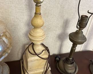 This is just a nice solid vintage table lamp. It needs a cleaning, possibly a new cord.