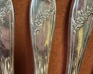 This is a large set of Oneida Tudor community plate flatware with extra pieces