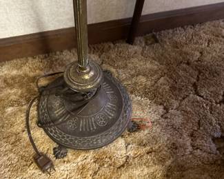 The base is ornamental and heavy
