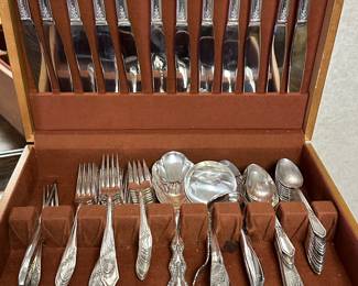 This is a large set of Oneida Tudor community plate flatware with extra pieces