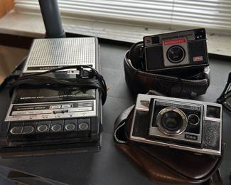 A vintage cassette player/recorder and a couple of Kodak Instamatic Cameras!