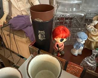 Lots of vintage items here! Zoom in on the photo for a closer look! Too much to describe! I love the mid searching modern our glasses and the Littel 1960s had nodded!