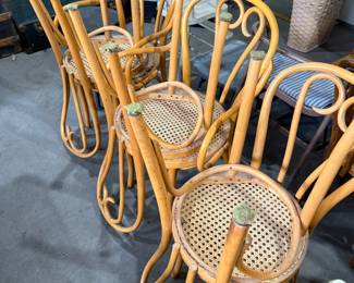 Here are six Bentwood canned bottom Café chairs. There are six total four regular and two captain.