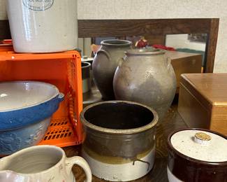 The buffet in the dining room is a perfect place to display all the beautiful crockery we have. Balls, crocs, pitchers, and jugs.