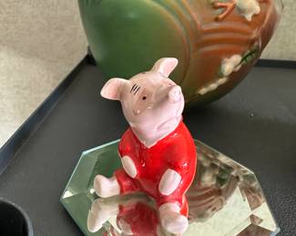 This little guy‘s BESWICK Piglet from Winnie the Pooh! He’s marked on the bottom of the Walt Disney mark