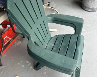 A pair of nice plastic Adirondack chairs!