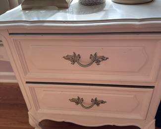 This is a lovely three-piece bedroom set for a young lady and the French provincial style white with gold trim! Full size bed, dresser with top shelves and a nightstand! In excellent condition