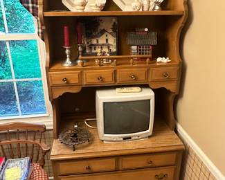 The dining room table and chairs also comes with this beautiful hutch, and there is also a wooden rolling cart that matches.