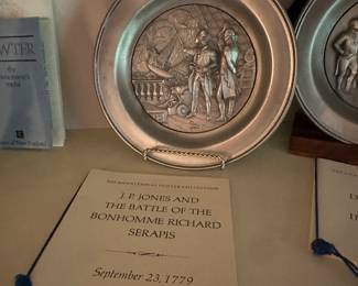This is a lovely small collection of pewter commemorative plates showing the revolutionary war and the Civil War