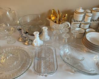 More pressed than cut glass and some lovely gold flatware