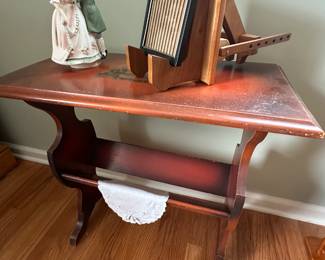 This is a great little side table with appliqué top