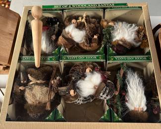 Here’s a collection of wooden Santas and the original