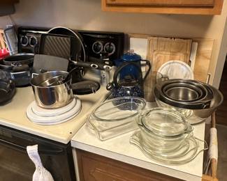 Here he has some glass and aluminum mixing bowls and more