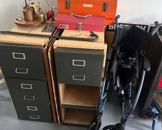 Some toolboxes that are full some great vintage oil cans a nice wheel wheelchair set