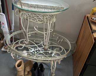 These are heavy wrought iron glass top patiotables