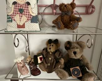Here are some great collectible bears on a wired with glass shelf bathroom unit